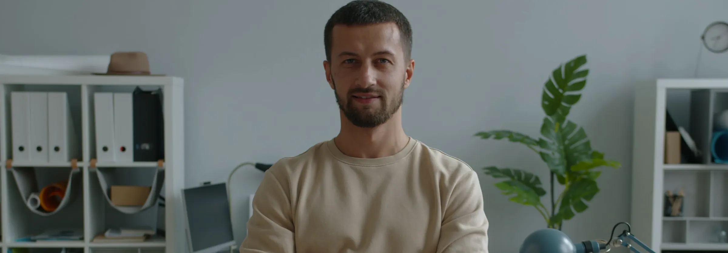 An investor on a video call in a bright office